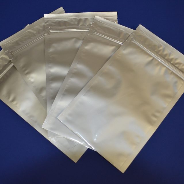 SL10250E is an OPP/ aluminum foil moisture barrier laminate. It is free of primary amines, amides, and silicone compounds.